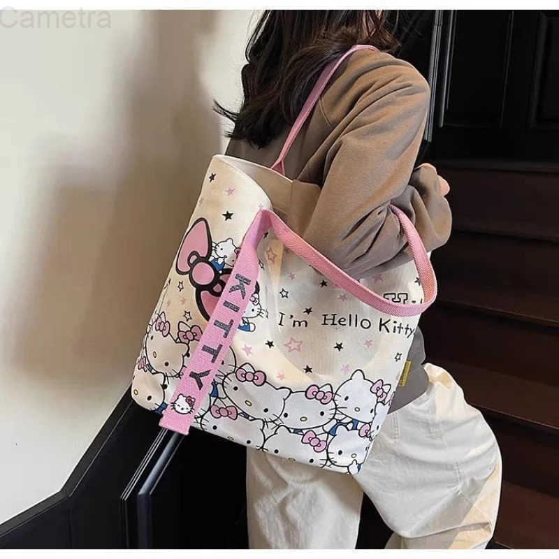 Sanrio Hello Kitty Canvas Shoulder Bag Cute Cartoon KT Cat Large Capacity Handbag Girls Backpack Schoolbag Holiday Gifts H251216
