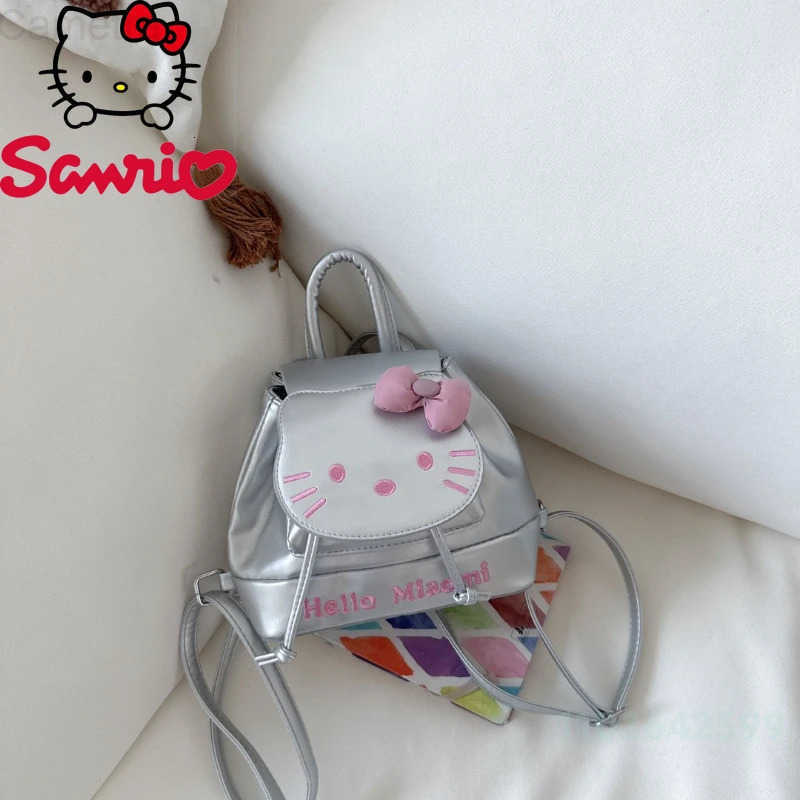 Sanrio HelloKitty 2025 New Student Backpack Fashion High Quality Pu Womens Shopping Backpack Cartoon Versatile Girl Mini Backpack H251216
