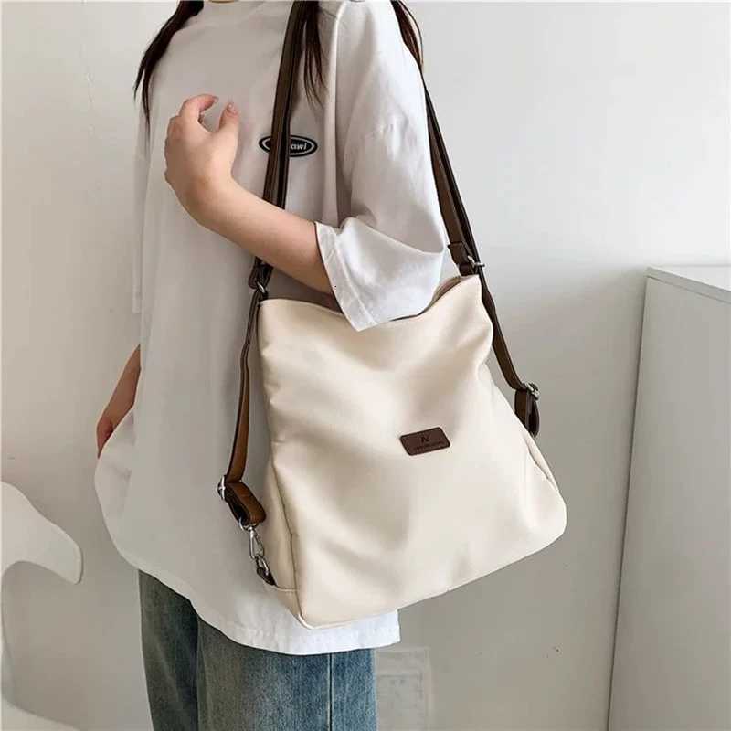 Canvas Tote Bag Womens High Capacity and Minimalist College Style Backpack Fashion Versatile Casual Shoulder Crossbody Bag M251216