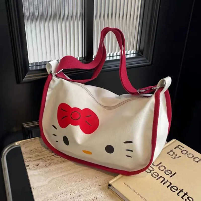 Sanrio MINISO Cartoon Letter Printed Canvas Bag Womens Crossbody Bag New Cute Dumpling Bag Commuter Hello Kitty Shoulder Bag H251216