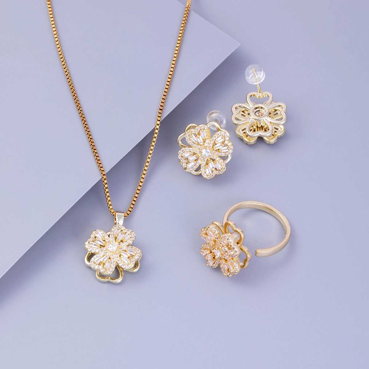 Popular Jewelry 4-Piece Set Super Flash Rotatable Ring AccESSible Luxury Niche Exquisite Bracelet Crystal Necklace Womens Ear Hook G251217