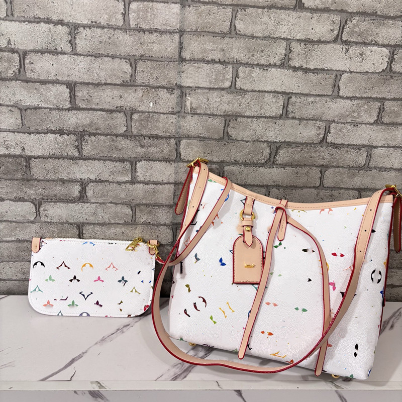 Womens Designer Bag Tote Bag Luxurys Carryall Handbags Classic Black Embossed Flowers Letter Underarm Bag Leather Woman Fashion Zipper Makeup Purse