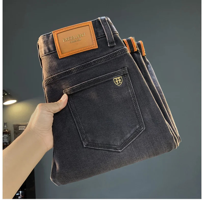 Nine point jeans s 2025 autumn trend black washed elastic versatile highend small leg pants men vintage handso 251205