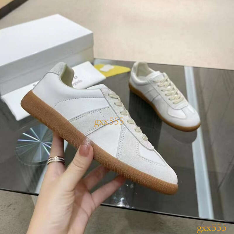 designer mens sports shoes black white grey rubber soles casual shoes in the mm6 collection formal shoes german army trainer