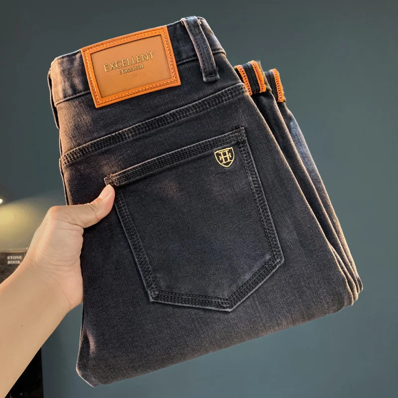 Nine point jeans s 2025 autumn trend black washed elastic versatile highend small leg pants men vintage handso 251205