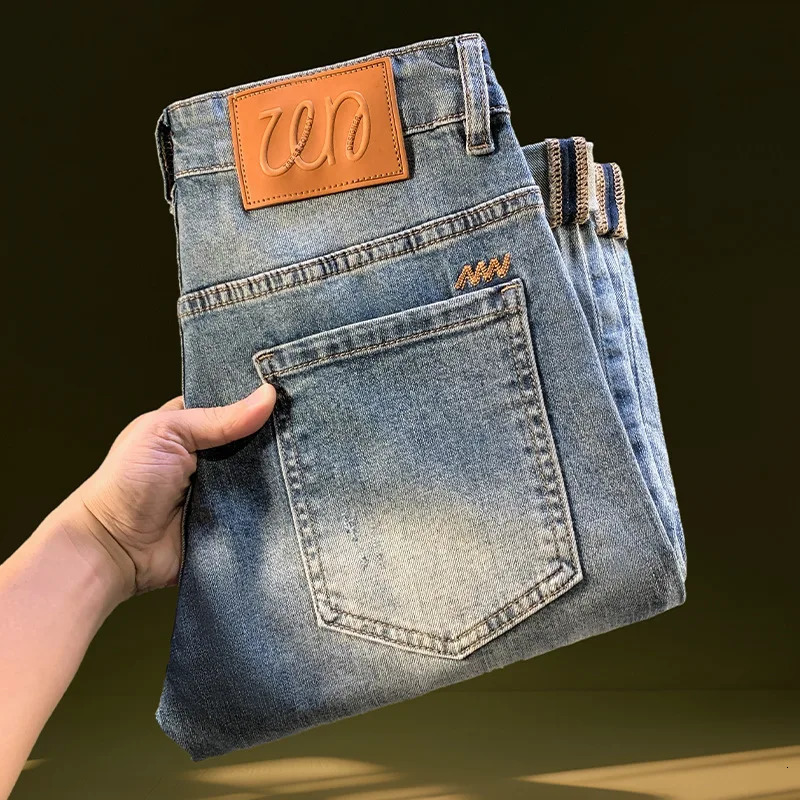 Nine point ripped denim jeans for men in the summer of 2025 thin and trendy retro washed n leg elastic pants y251205