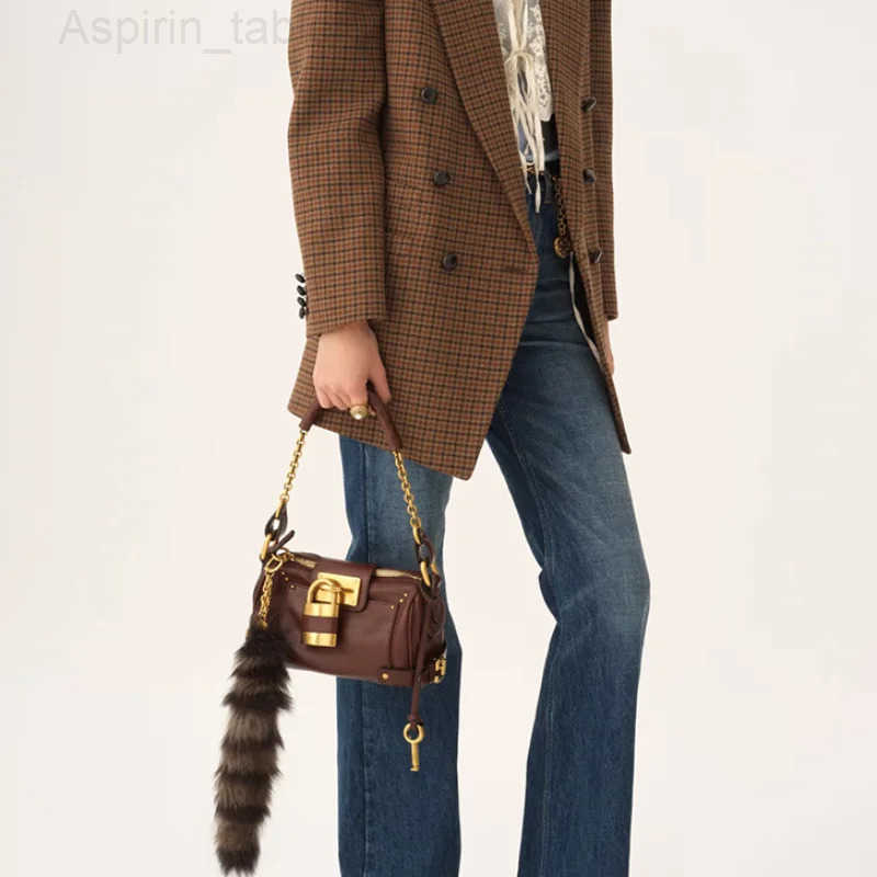 Small Handheld Lock Bag High-quality Leather Bag Chain Handle Design Shoulder Bag Women Horizontal Square Creative Armpit Bag H251218