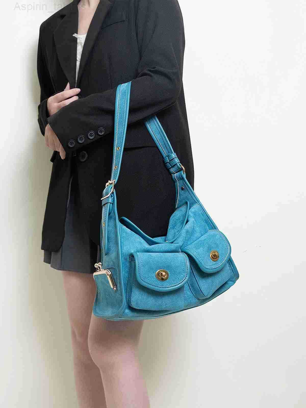 HIATUS medieval gilt lock multi-pocket shoulder pillow bag retro literary and casual wide shoulder strap commuter bag H251218