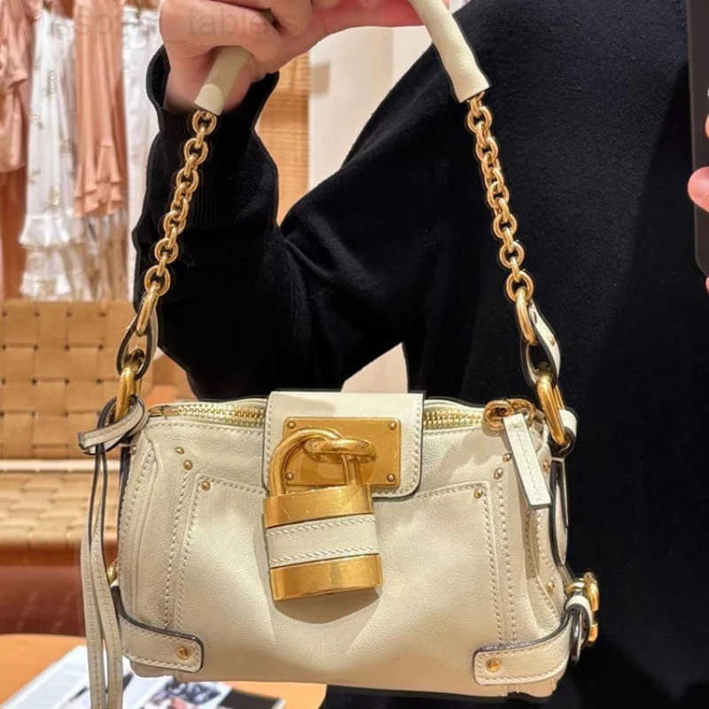 Small Handheld Lock Bag High-quality Leather Bag Chain Handle Design Shoulder Bag Women Horizontal Square Creative Armpit Bag H251218