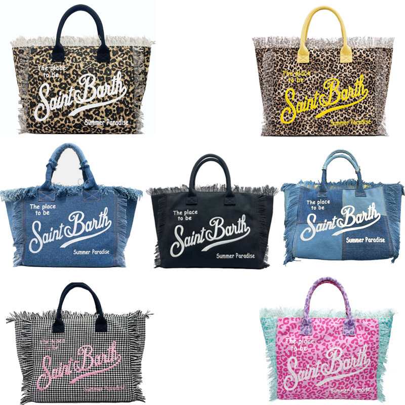 New European and American style denim handbag bag with large capacity tassel canvas for women outdoor parent child designer diaper bag