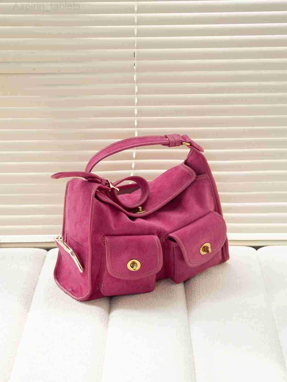 HIATUS medieval gilt lock multi-pocket shoulder pillow bag retro literary and casual wide shoulder strap commuter bag H251218