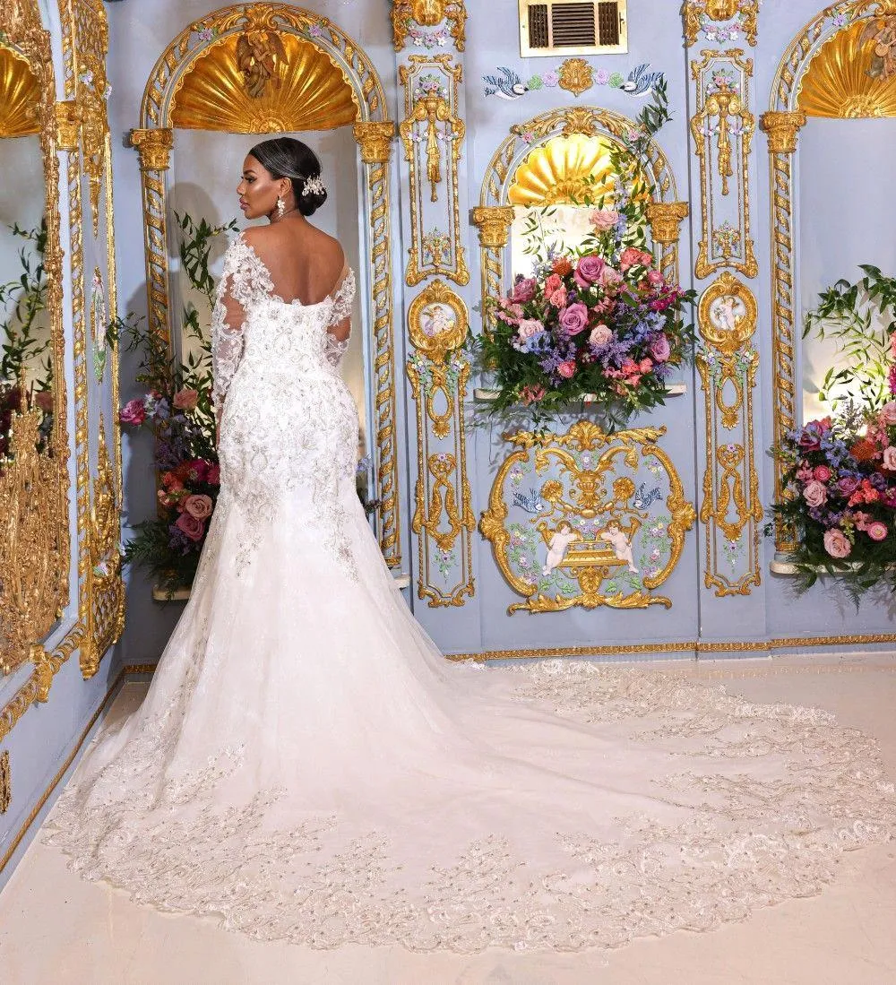 Luxurious Mermaid Wedding Dresses Beaded Lace Appliques Long Sleeves African Arabic Bridal Gowns Court Train Ivory Backless Bride Dress