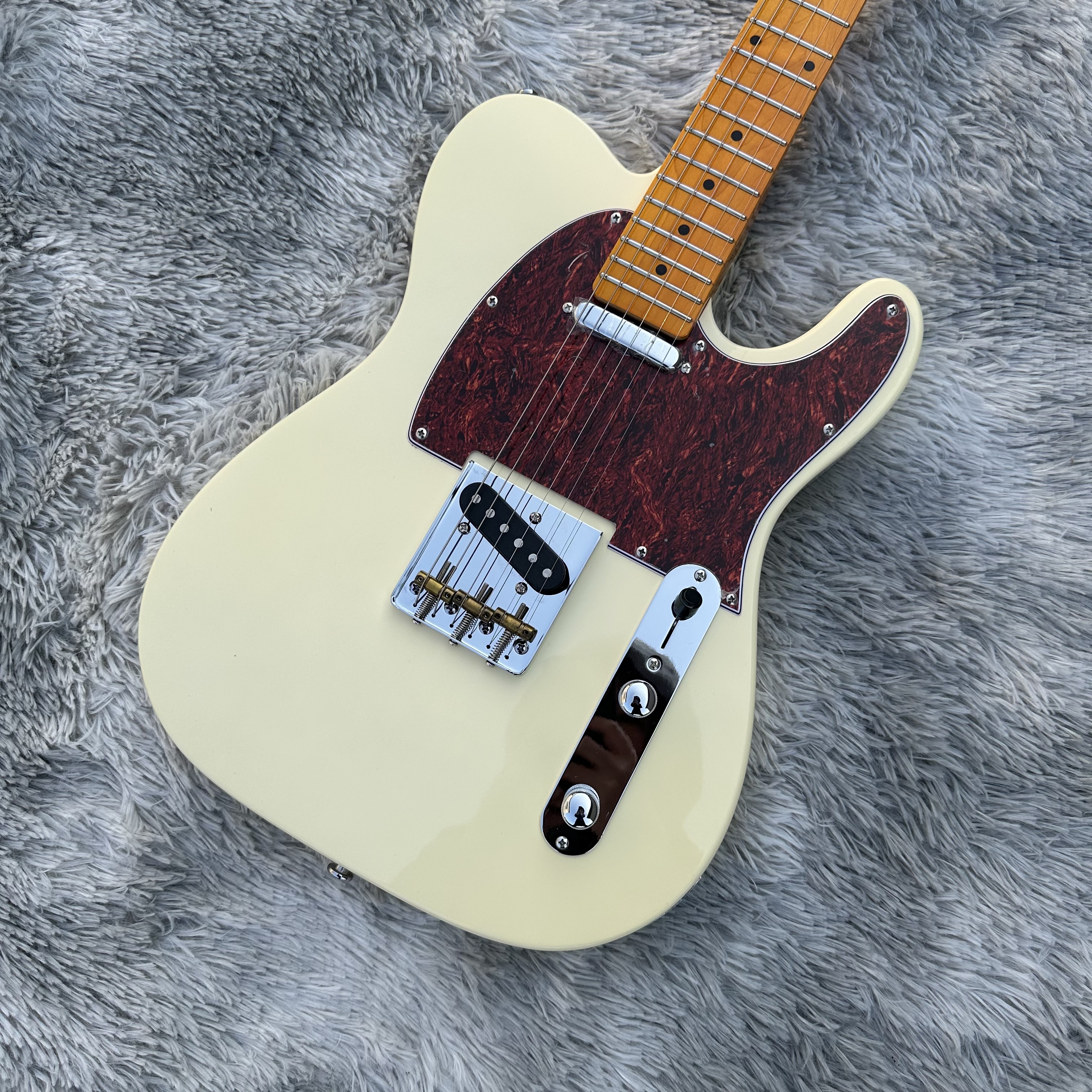 Telecast Electric Guitar, Milk yellow imported paint, copper bridge, imported alder body, Canadian maple neck, lightning package