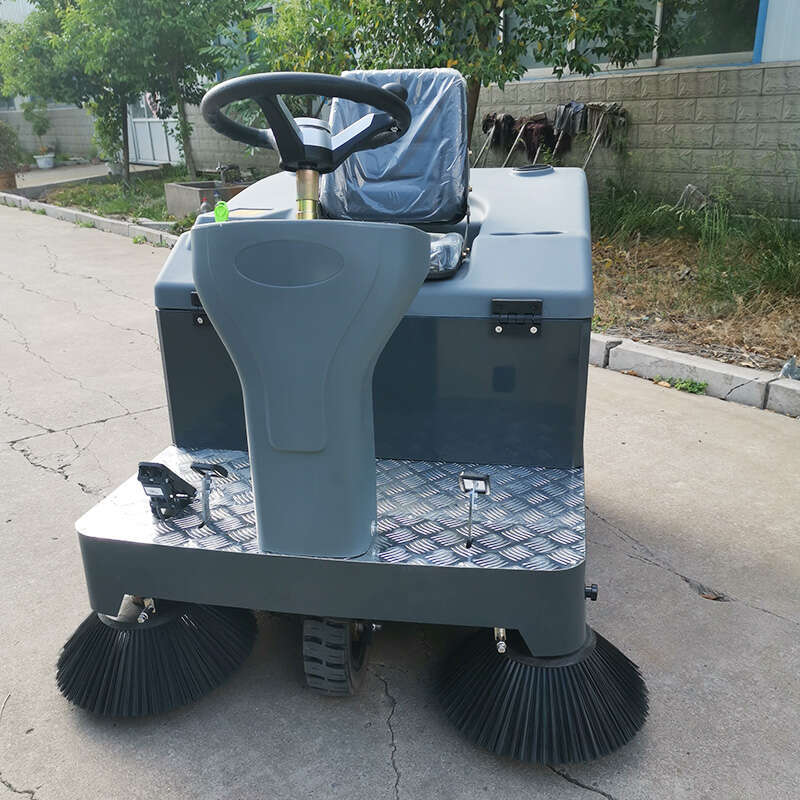 Compact Ride-On Sweeping Vehicle with High Maneuverability for Narrow Aisles and Crowded Spaces