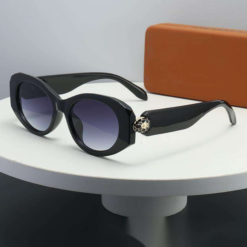 New Oval European and American Style Personality Metal Snake Head Cross-Border Fashion Versatile Sunglasses for Women with a Sense of Sophistication