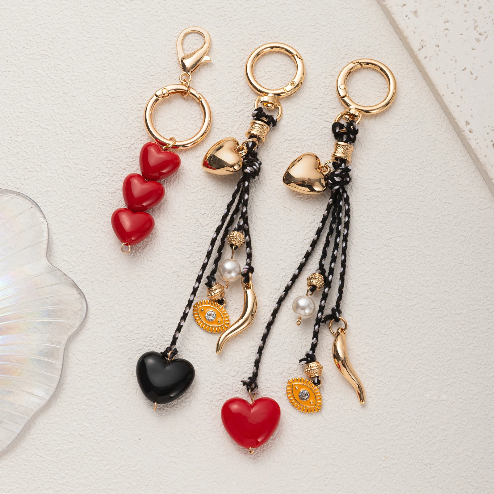 Simple elegant and atmospheric bag accessories macaron color heartshaped pearl 251219