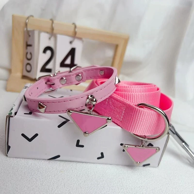Cute luxury leather pet collar and leash set with classic triangular metal charm, suitable for dogs and cats.