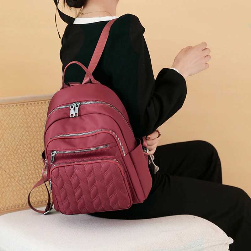 Mens and womens fashionable backpack made of nylon suitable for travel tourism and photography It has multiple pocketsM251222