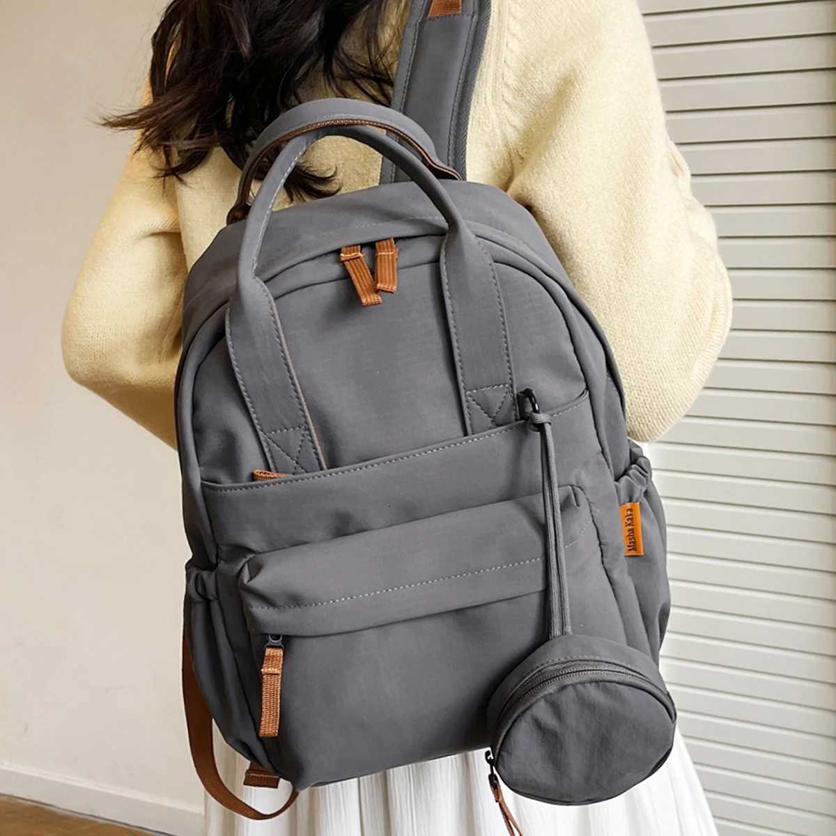 ashionable Commuter Backpack for Women Niche Backpack for College Students Simple and Lightweight Travel Backpack School Bag for High School and Middl