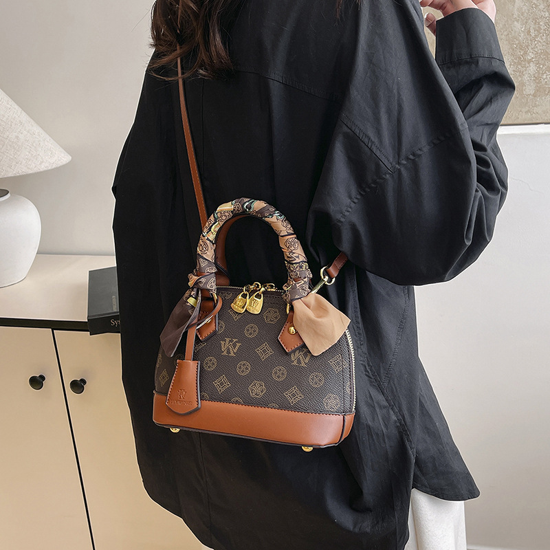 LUYIWEINASI Premium contrasting color presbyopia portable shell bag women's 2025 new light luxury European and American women's shoulder bag