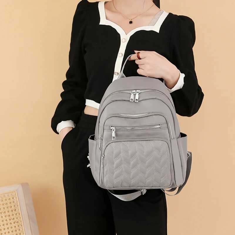 Mens and womens fashionable backpack made of nylon suitable for travel tourism and photography It has multiple pocketsM251222