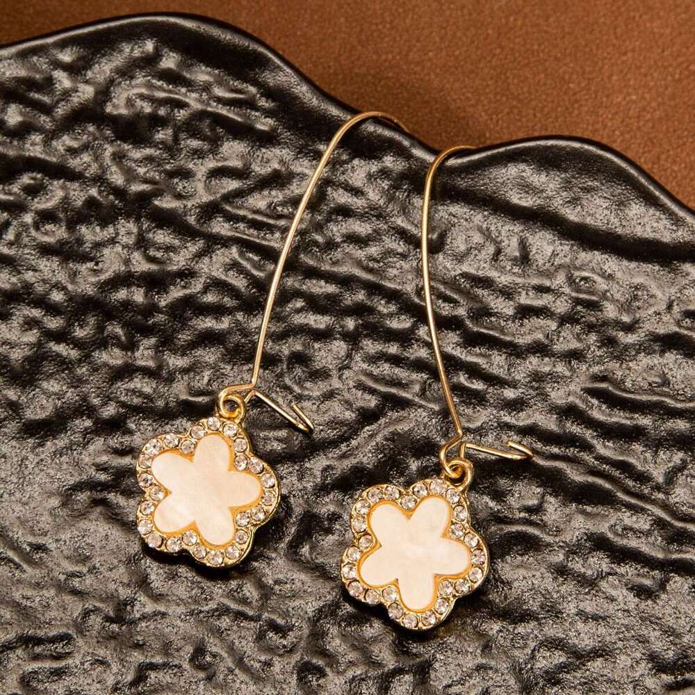 Exquisite Light Luxury Elegant Temperament Flower Pendant Five-leaf Clover for Women High-end designer Rhinestone Earrings