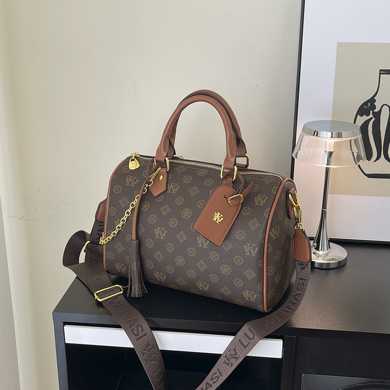 LUYIWEINASI Premium sense portable pillow bag women's 2025 new retro printed women's cylinder bag shoulder bag oblique span bag tide