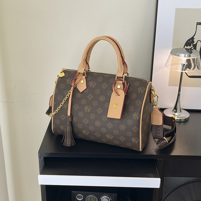 WK Premium sense portable pillow bag women's 2025 new retro printed women's cylinder bag shoulder bag oblique span bag tide