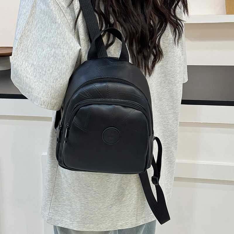 Neutral style backpack for men and women suitable for travel and school use PU material pure black small bagM251222