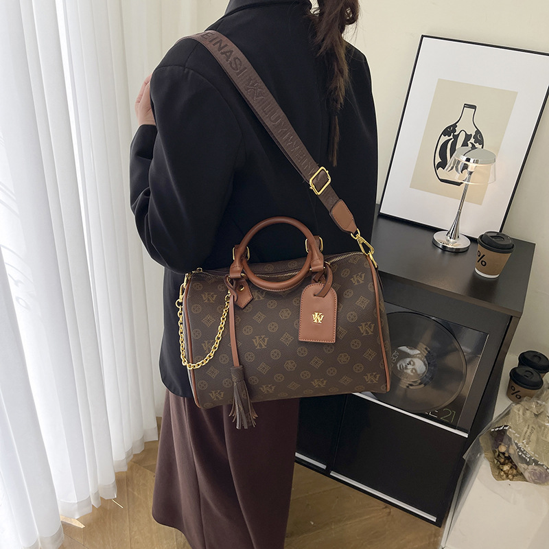 WK Premium sense portable pillow bag women's 2025 new retro printed women's cylinder bag shoulder bag oblique span bag tide