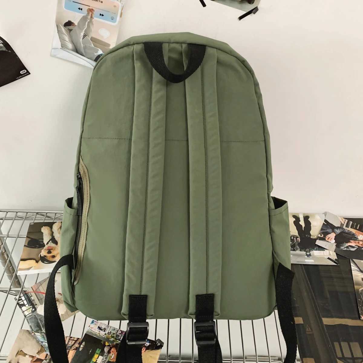 choolbags for Primary School s in Grades Three to Six UltraLightweightW aterproofL argeCapacityBa ckpacksfo rJu niorHi ghSc hoolSt udentsLi ghtweigM25