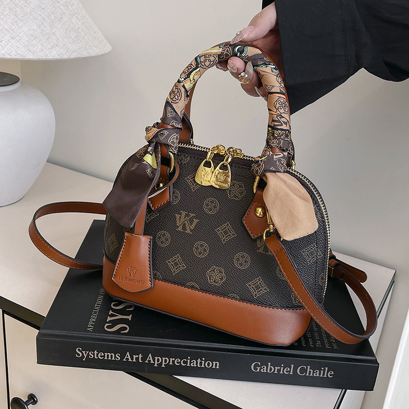 Wk 2025 new shell bag, high-end printed portable messenger bag, versatile bag, popular women's shoulder bag this year