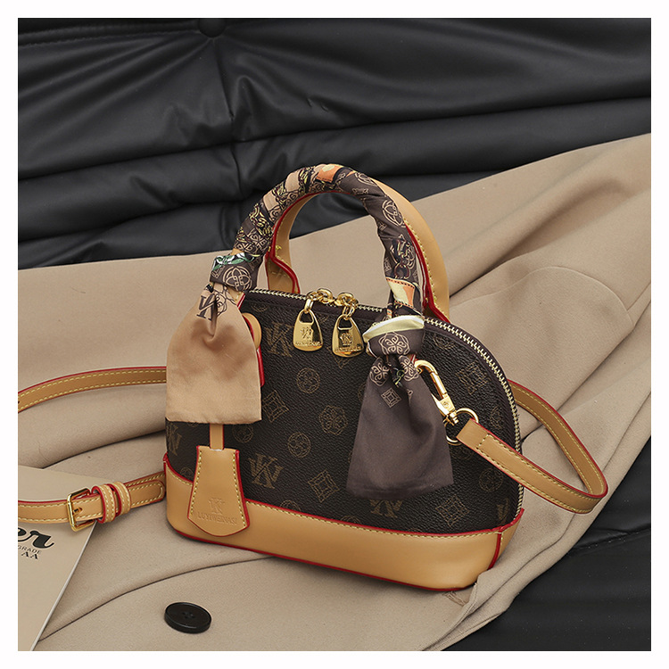 Wk 2025 new shell bag, high-end printed portable messenger bag, versatile bag, popular women's shoulder bag this year