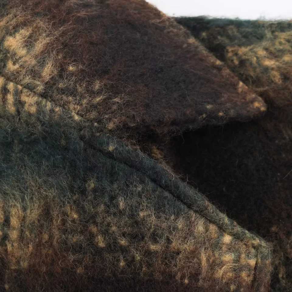 Womens loose fitting coat with collar long sleeved pocket and waist belt split back autumn and winter new style temperamentT251224