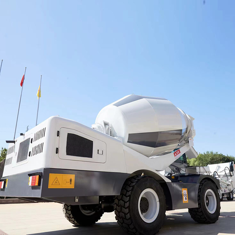 Self-Loading Concrete Mixer with Safety Features | Emergency Stop for Secure Job Site Operation