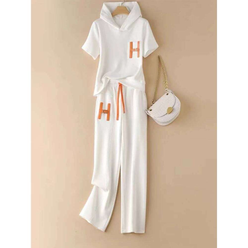 Designer Clothes Early Spring Women S Stylish And Casual Age Reducing Slimming Short Sleeved Sports Top Wide Leg Pants Fashion Two Piece Set Hot Selli