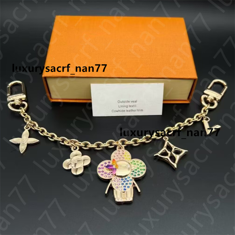 Designer Keychains Car Key Chain Bags Decoration Cowhide Gift Letters Flower Design for Man Woman 20 Option Top Quality Accessories with box
