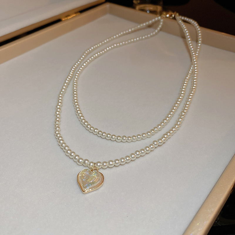 Luxury Creative Design Fashion Jewelry French Style Pleated Pendant Pearl Necklace Light Luxury High-End Clavicle Chain Women's Fashionable Elega