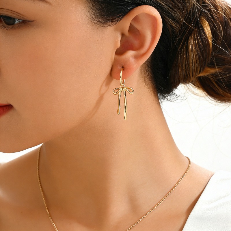 Creative new bow tassel simple elegant minimalist unique gold premium earrings H260202