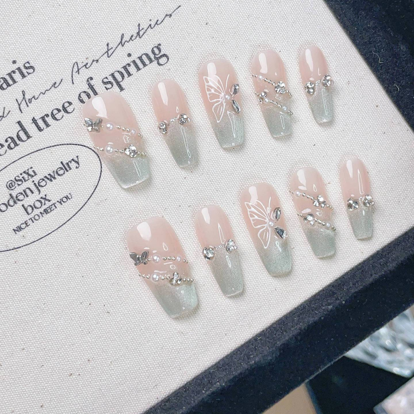 charming flower adorned felineeye shaped polish finishers resilient mint shade