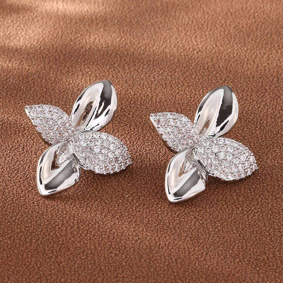 ZAKOL Brand New Smooth Metal Micro-set Zircon Leaf Stud Earrings for Women Exquisite Party Jewelry Accessories Gift
