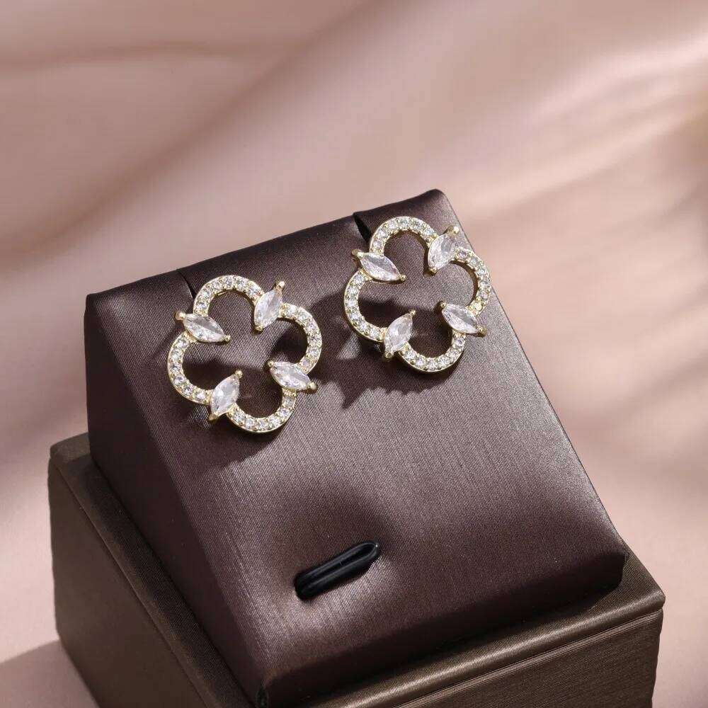 ZAKOL High-End Luxury Zircon Hollowed out Four-Leaf Flower Stud Earrings for Women Elegant Party Jewelry Gift Accessory