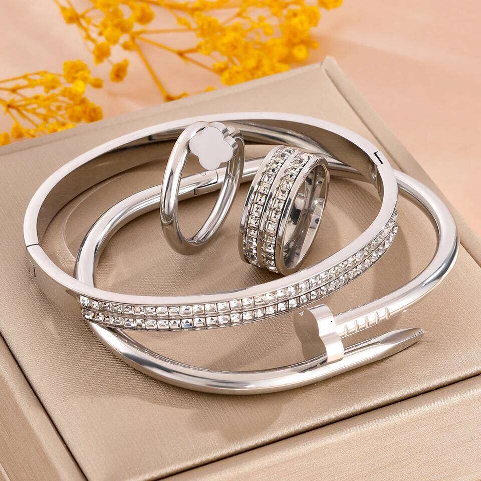 ZAKOL 4 Piece Stainless Steel Bracelet Set Sparkling Rhinestone Studded Heart Waterproof Stackable Jewelry Christmas Gift