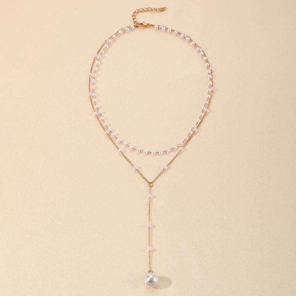 ZAKOL Korean Fashion Imitation Pearl Double Layered Choker Big Ball Bead Pendant Tassel Necklace Women's Sexy Party Body Jewelry