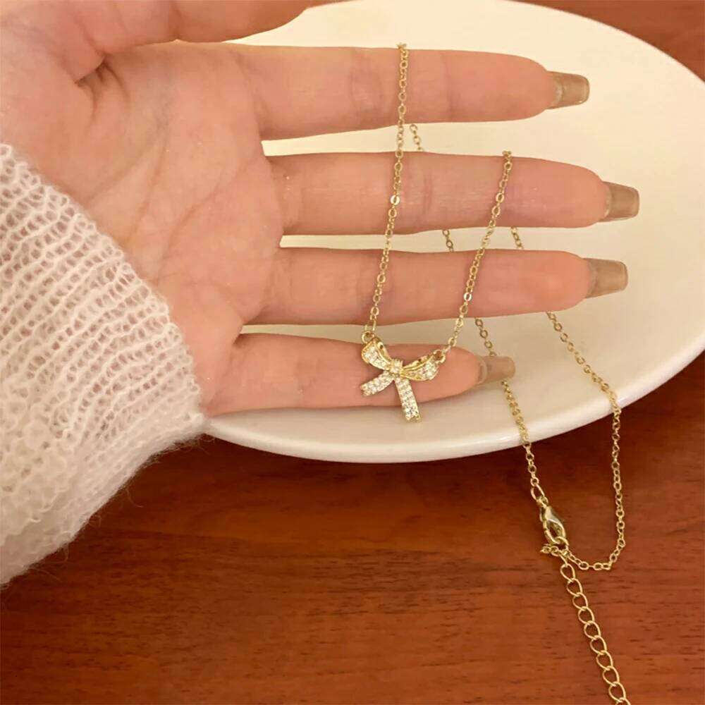 ZAKOL Exquisite Copper Inlaid Zirconia Bow Pendant Necklace for Women Girls Sweet Bridal Wedding Accessories