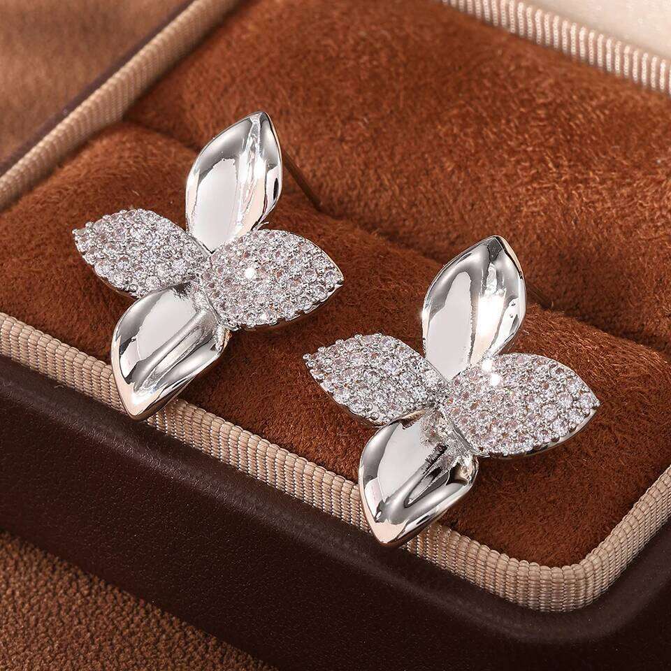 ZAKOL Brand New Smooth Metal Micro-set Zircon Leaf Stud Earrings for Women Exquisite Party Jewelry Accessories Gift