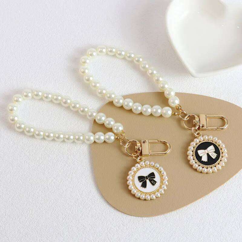 ZAKOL Cute Bow Keychain for Women Girls Shiny Pearl Beads Mobile Phone Bag Backpack Pendant Accessories Car Key Chain