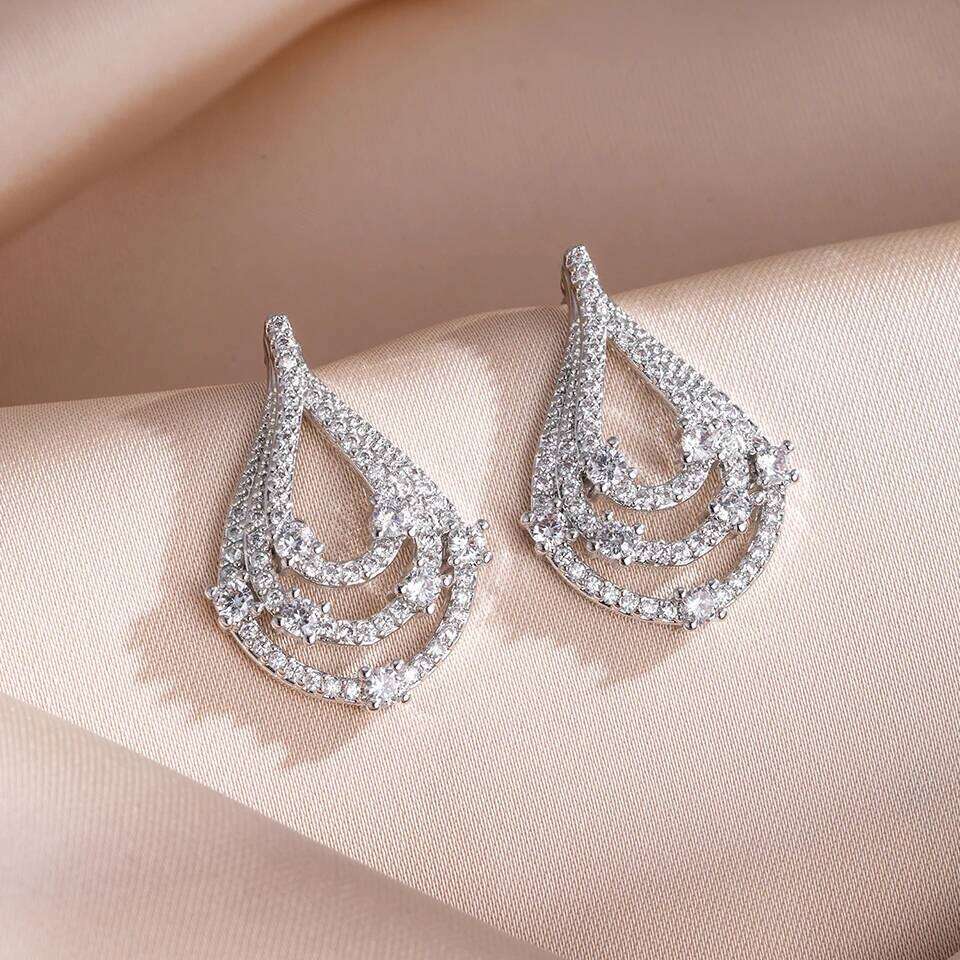 ZAKOL Simple Light Full Zirconia Hollow Water Drop Stud Earrings for Women Shining CZ Wedding Party Jewelry Accessories