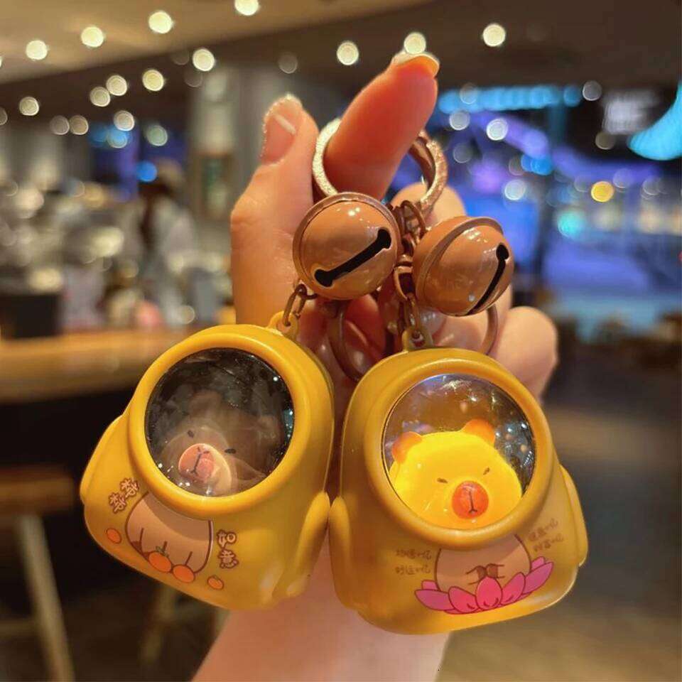 ZAKOL Creative Kapibala Luminous Keychain Cute Cartoon Space Capsule Capybara Keyring Bag Pendant Trinket Accessories Gift