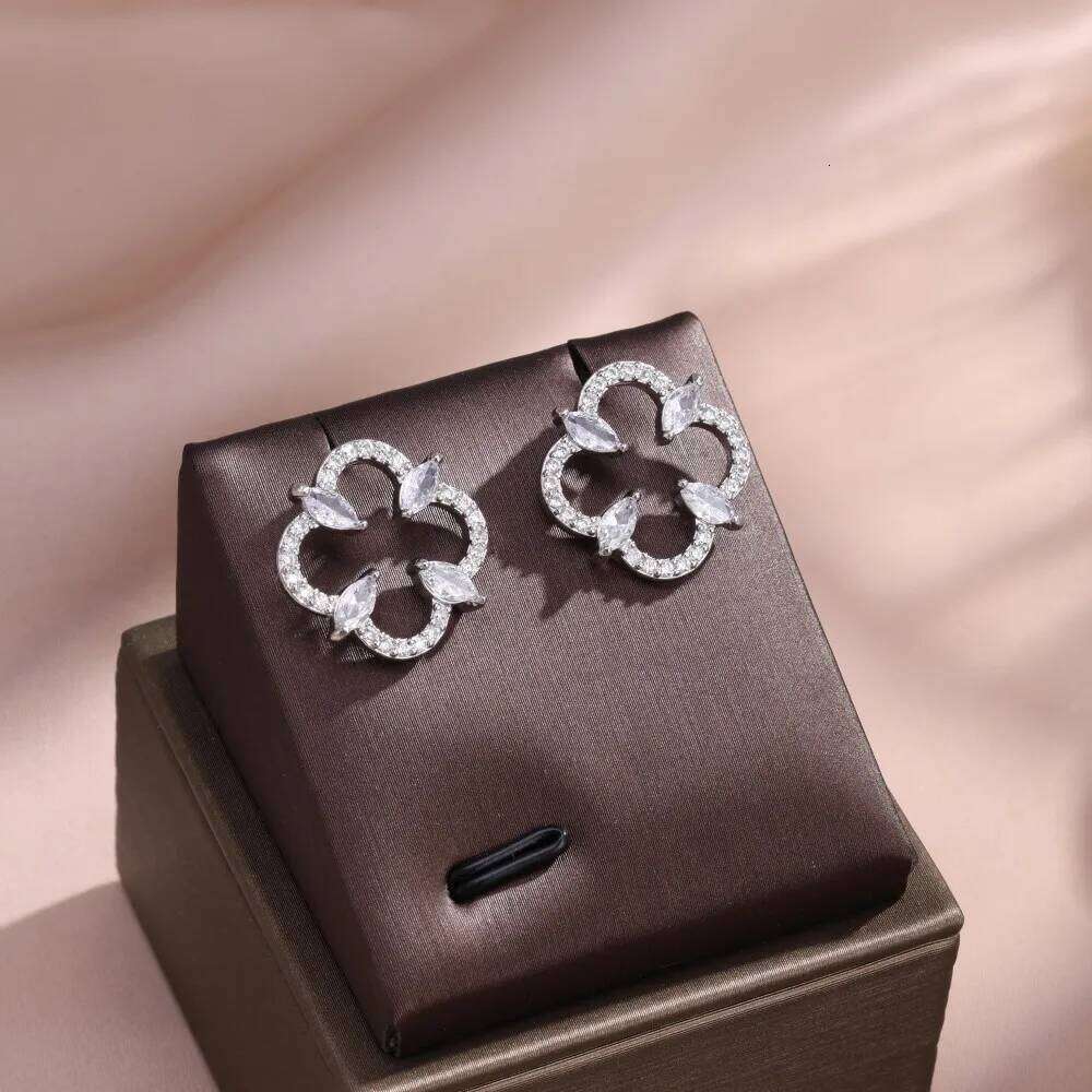 ZAKOL High-End Luxury Zircon Hollowed out Four-Leaf Flower Stud Earrings for Women Elegant Party Jewelry Gift Accessory